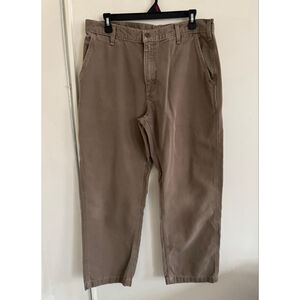 vintage Carhartt duck canvas dungaree fit work pants in a beige/tan size 34/30